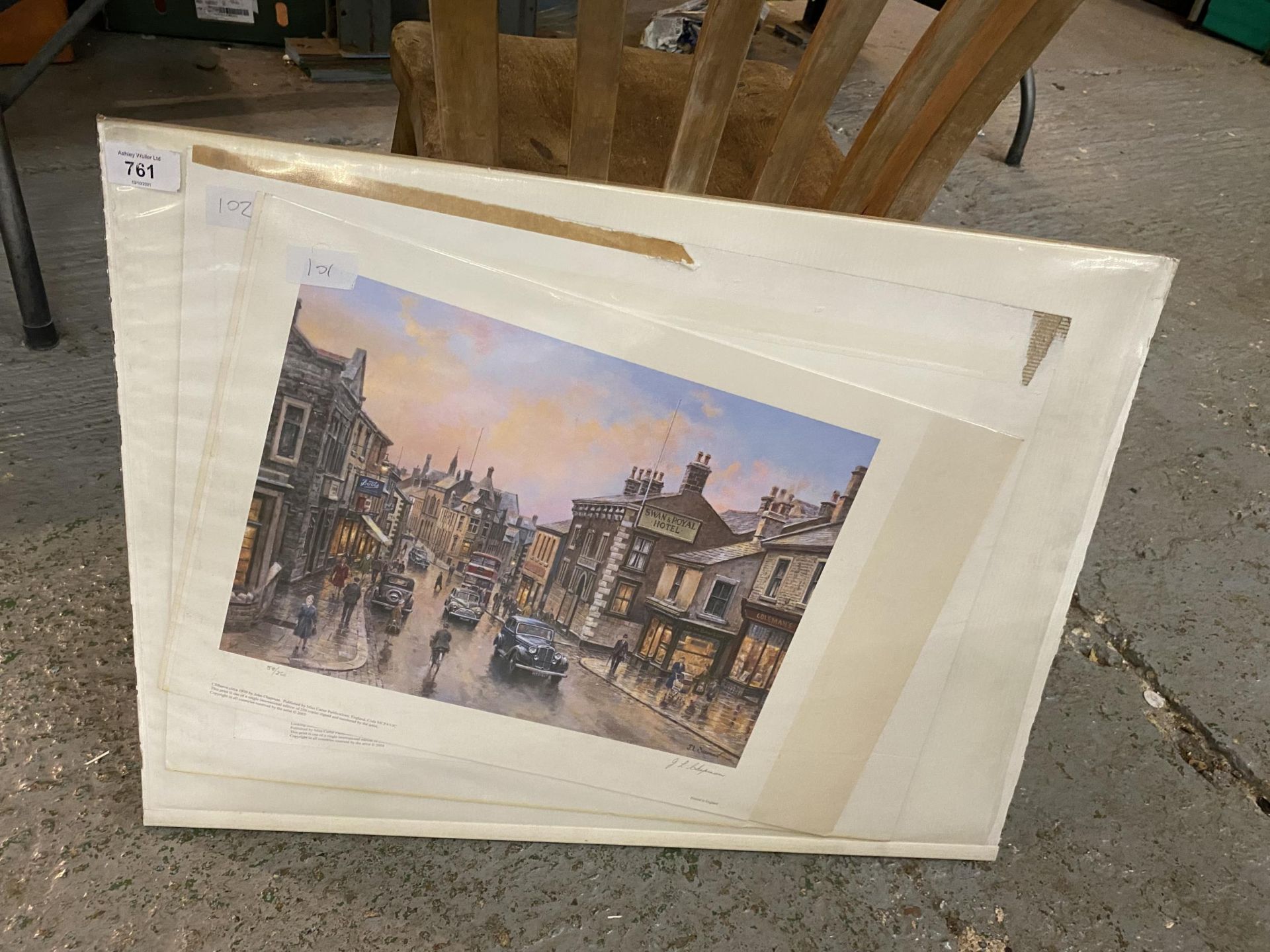 TWO MOUNTED PRINTS SIGNED J L CHAPMAN. ONE OF LOOKING SOUTH, MARKET PLACE, WIGAN LIMITED EDITION