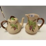 TWO PIECES OF WADE CHINA TO INCLUDE A TEA POT AND JUG WITH BRAMBLE DESIGN