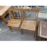 A PAIR OF FOLDING GARDEN CHAIRS