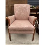 A PARKER KNOLL PK 749 MAHOGANY FRAMED ARMCHAIR