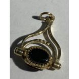 A 9 CARAT GOLD FOB WITH COLOURED STONES GROSS WEIGHT 2.8 GRAMS