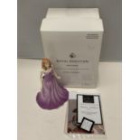 A BOXED ROYAL DOULTON GEMSTONES FIGURINE WITH A GENUINE SWAROVSKI CRYSTAL - FEBRUARY AMETHYST