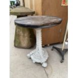 A 19TH CENTUARY COALBROOKDALE CAST IRON TABLE BASE WITH WOODEN TOP ON SCROLL FEET AND THE COLUMN