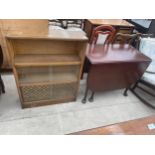 A DROP LEAF TABLE AND BOOKCASE