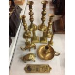 A QUANTITY OF BRASSWARE TO INCLUDE EIGHT CANDLESTICKS, AN ELEPHANT, TORTOISE, A CANDLE HOLDER AND