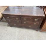 A GEORGE III OAK AND CROSSBANDED LANCASHIRE CHEST ON BRACKET FEET, 55" WIDE