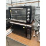 AN ELECTROLUX MICROWAVE OVEN AND A SIGNATURE COUNTER TOP COOKER