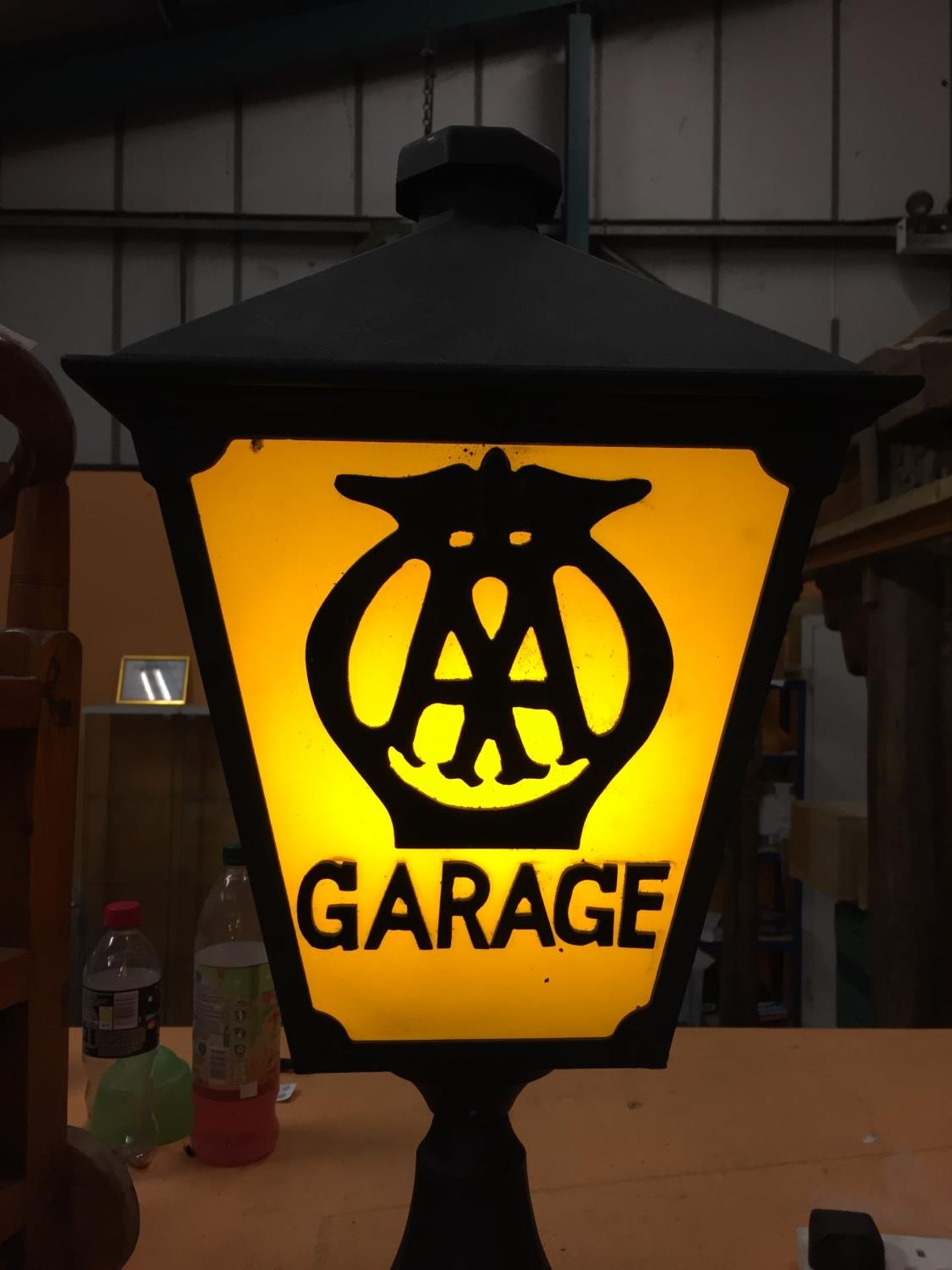 A CAST METAL LAMP WITH AA GARAGE THREE SIDED DETAIL TO PANELS AND BELIEVED IN WORKING ORDER BUT NO - Image 2 of 4