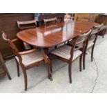 A MAHOGANY DINING TABLE AND SIX CHAIRS, TWO BEING CARVERS