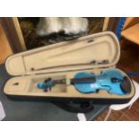 A BLUE VIOLIN COMPLETE WITH BOW AND CASE