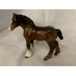 A BESWICK FOAL (A/F)