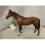 A BESWICK MATT BAY THOROUGHBRED HORSE FIGURINE