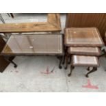 A NEST OF THREE TABLES AND COFFEE TABLE WITH INSET LEATHER TOP