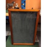 A WOODEN FRAMED COUNTER TOP DISPLAY CABINET