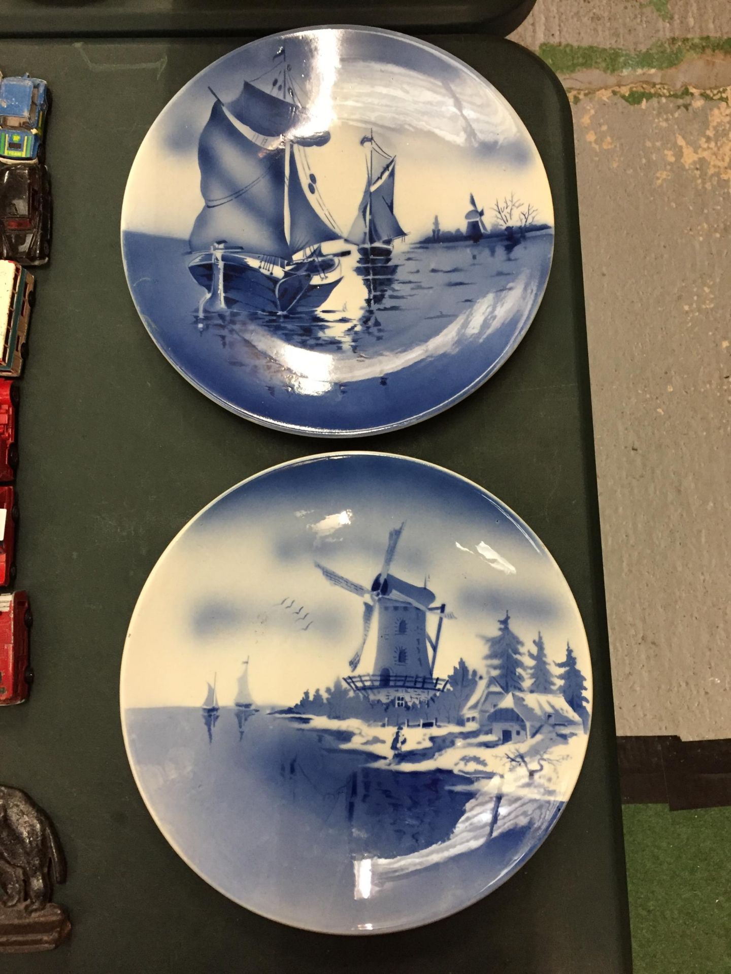 A PAIR OF BLUE AND WHITE DELPH PLAQUES