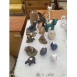 AN ASSORTMENT OF CERAMIC ANIMAL FIGURES TO INCLUDE CATS, DOGS AND OWLS ETC