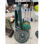 A FOLDING GARDEN CHAIR, A HOSE PIPE ON A REEL AND FIVE WIRE HANGING BASKETS