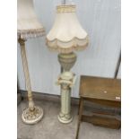 A MODERN TABLE LAMP STANDING ON CORINTHIAN STYLE COLUMN, COMPLETE WITH SHADE