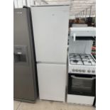 A WHITE WHIRLPOOL INTERGRATED FRIDGE FREEZER