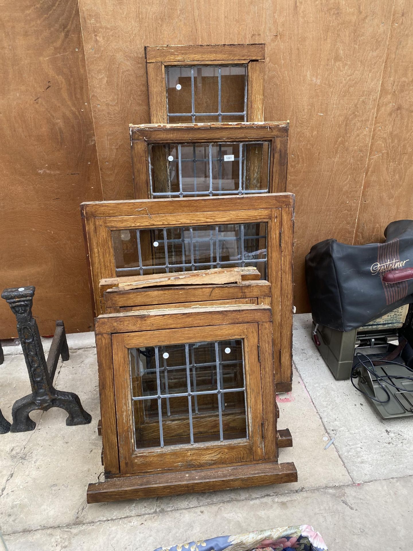 A GROUP OF SIX VARIOUS GLAZED AND LEADED WOODEN WINDOWS