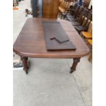 A VICTORIAN OAK WIND-OUT DINING TABLE, 74 X 54" (EXTRA LEAF 20") ON TURNED TAPERING LEGS, COMPLETE