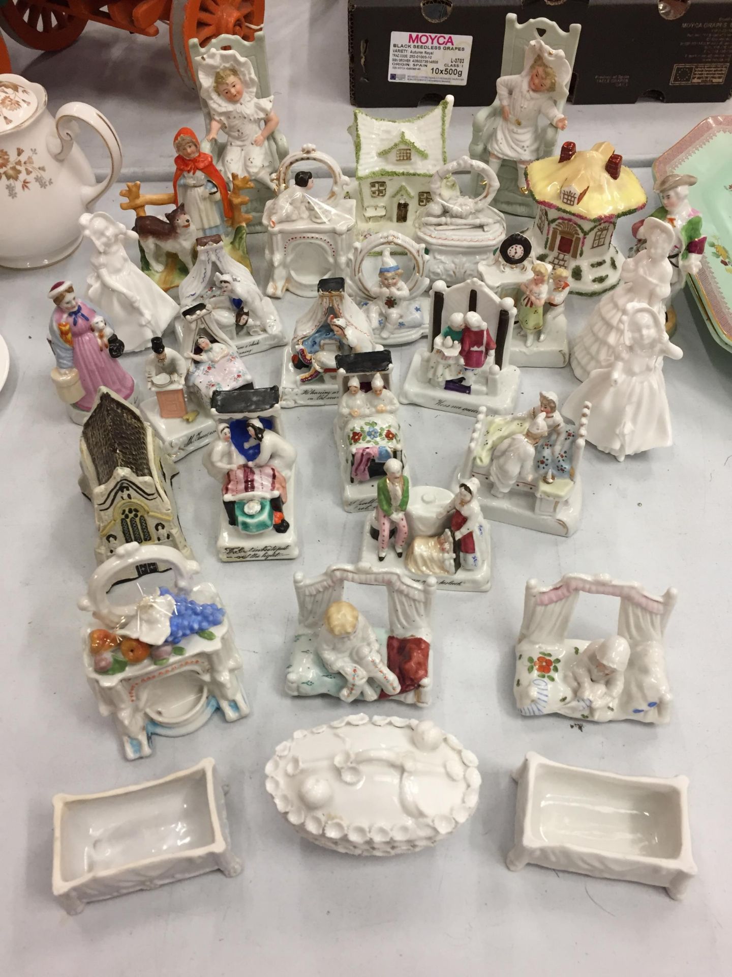 NINE VARIOUS DECORATIVE CERAMICS TO INCLUDE COALPORT COTTAGES, TWO ROYAL DOULTON FIGURES BABIE ETC