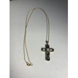 A 9 CARAT GOLD NECKLACE WITH A COLOURED STONE CROSS GROSS WEIGHT 3.2 GRAMS