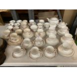 A LARGE QUANTITY OF CUPS, SAUCERS AND SIDE PLATES TO INCLUDE PARAGON BELINDA, TUDOR FINE BONE