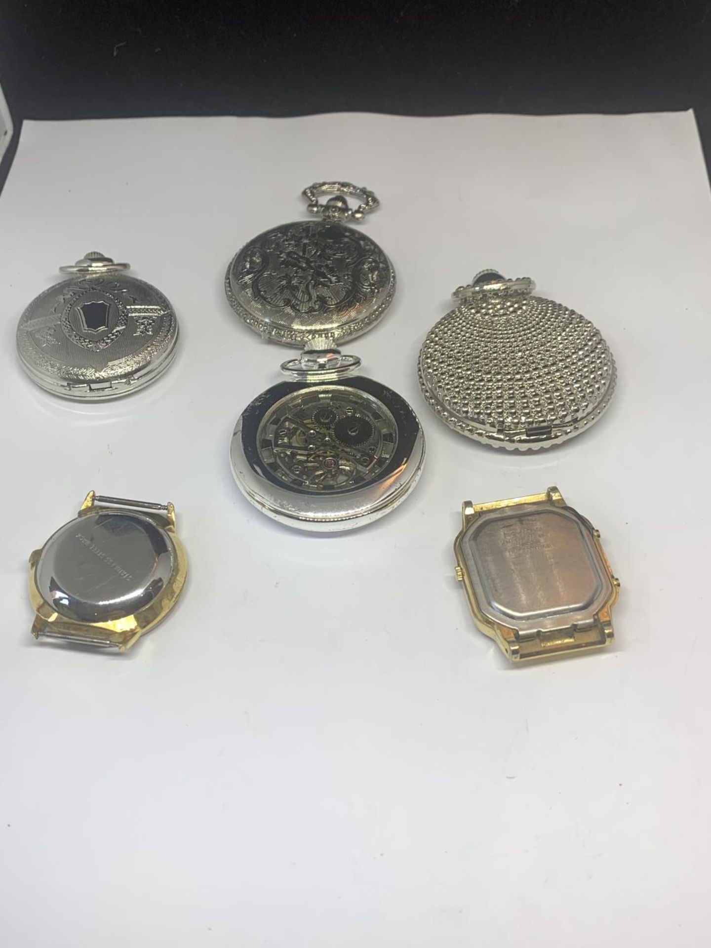 SIX VARIOUS WATCHES TO INCLUDE FOUR WHITE METAL POCKET WATCHES AND TWO WRIST WATCHES WITHOUT STRAPS - Image 2 of 3