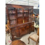 A MAHOGANY AND INLAID REPRODUCTION BOOKCASE ON BASE, 72" WIDE