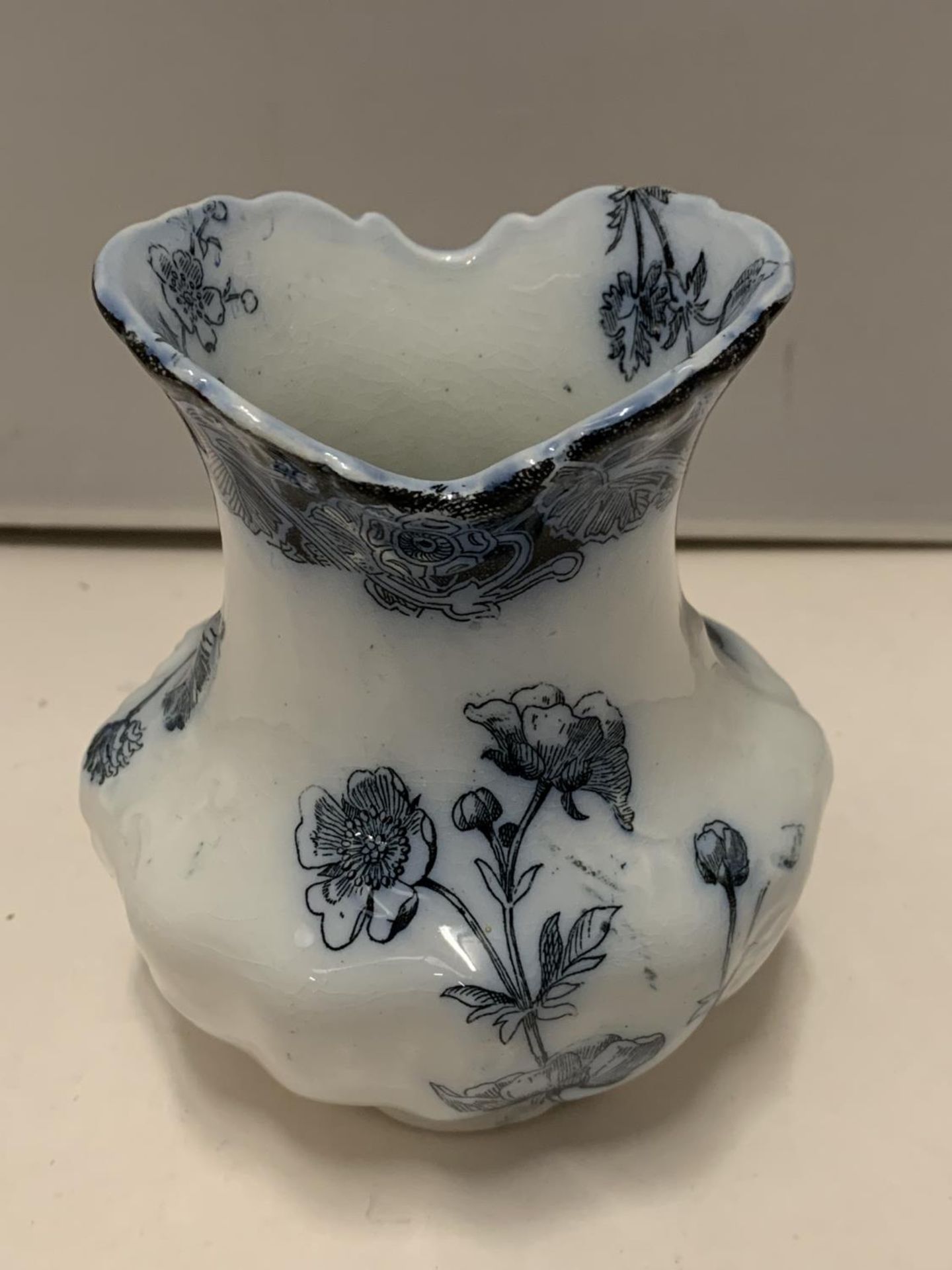 A DOULTON BUTTERCUP VASE