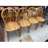 FOUR MODERN WHEELBACK WINDSOR STYLE DINING CHAIRS