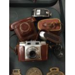 A VINTAGE CAMERA WITH CASE