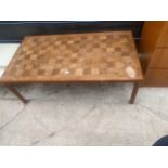 A RETRO WOOD BLOCK TOP COFFEE TABLE STAMPED MOBLEFABRIKKEN, TORTEN (MADE IN DENMARK), 49 X 27"