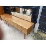 A REETRO TEAK SCHREIBER DRESSING TABLE AND BEDSIDE CHEST