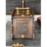 AN OAK COAL BOX WITH BRASS DETAIL, GALVANISED LINING AND A BRASS COAL SHOVEL