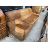 A 1970'S LEATHER AND SUEDE THREE SEATER SETTEE