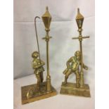 TWO BRASS FIGURES, ONE OF A STREETLAMP LIGHTER WITH DOG AND ONE OF A DRUNKEN MAN