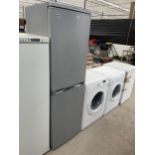 A SILVER HOTPOINT ICED DIAMOND UPRIGHT FRIDGE FREEZER