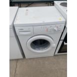 A WHITE BOSCH MAXX6 WASHING MACHINE WITH INSTRUCTION MANUAL