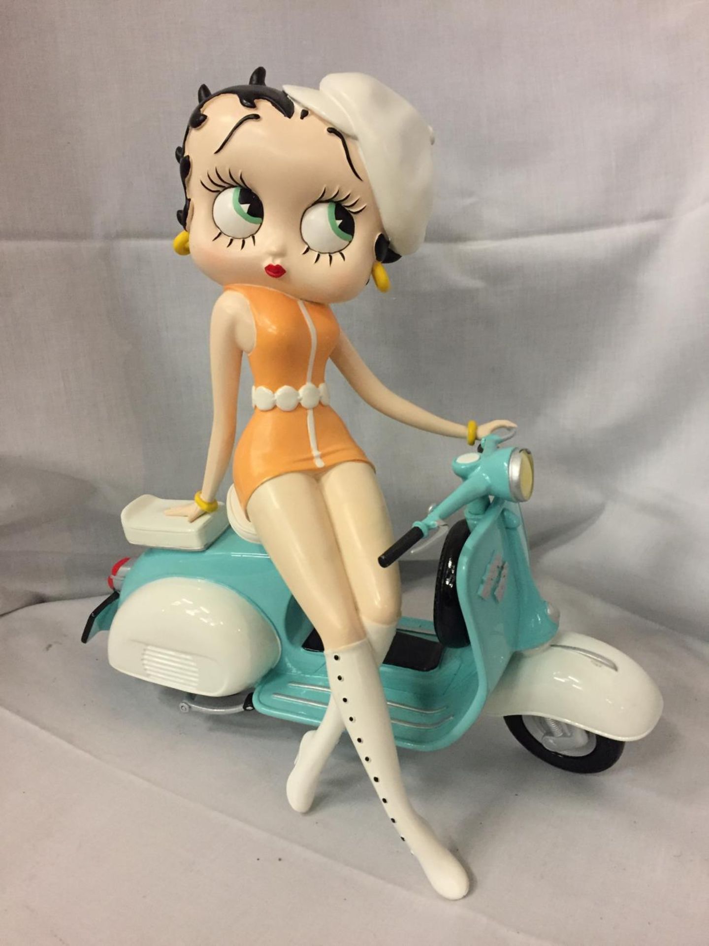 A BETTY BOOP ON A MOPED