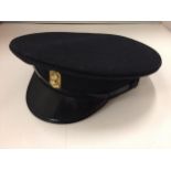 A MILITARY PEAKED CAP SIZE 57