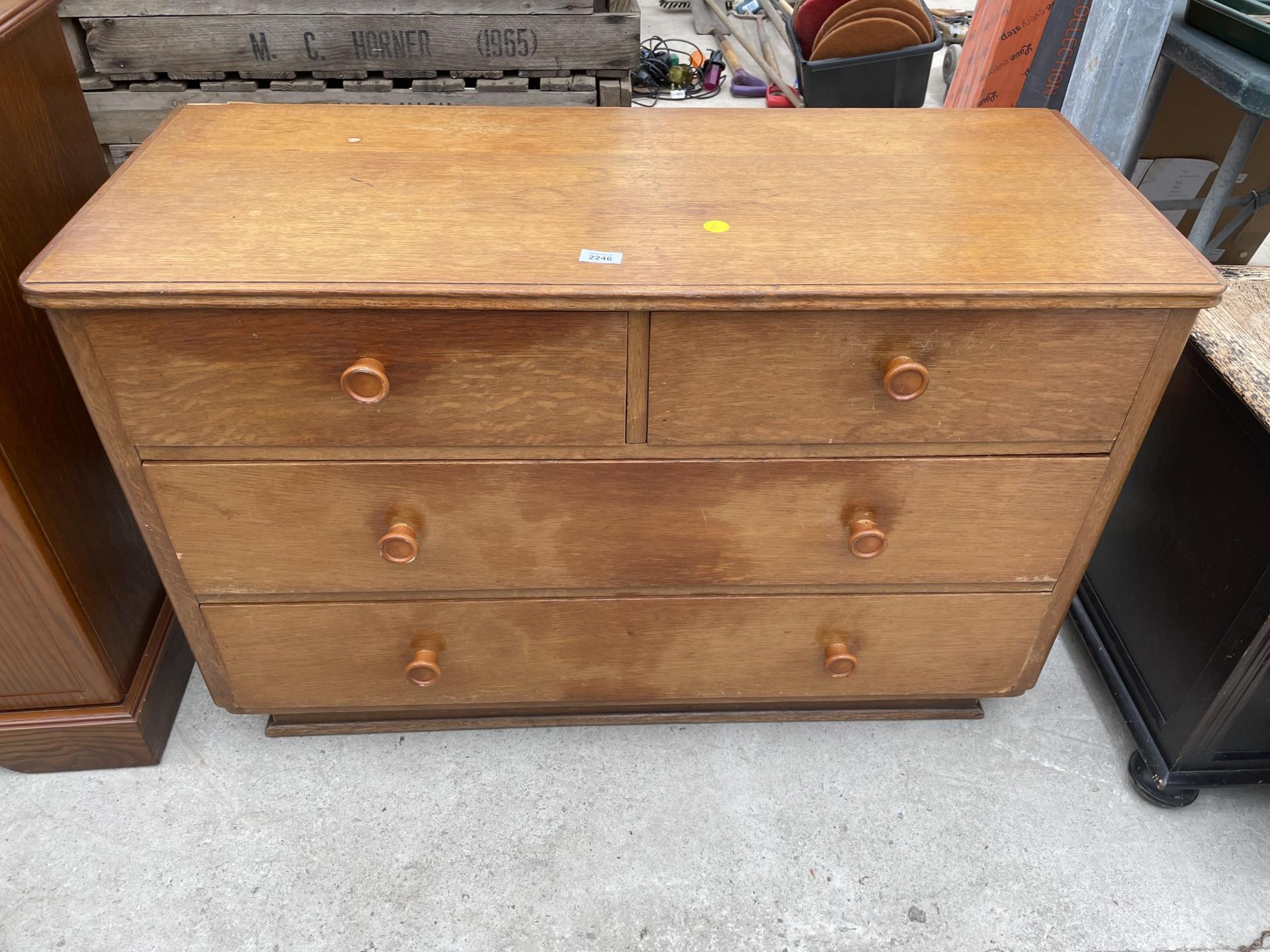 A MID 20TH CENTURY OAK CHEST OF TWO SHORT AND TWO LONG DRAWERS, 42" WIDE