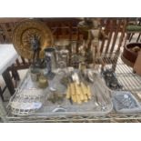 AN ASSORTMENT OF ITEMS TO INCLUDE A BRASS CHARGER, EPNS CANDLESTICKS AND FLATWARE ETC
