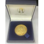 A ROBBIE BURNS 250TH ANNIVERSAY MEDALLION IN A PRESENTATION BOX