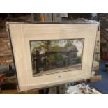 A FRAMED PICTURE OF A TUDOR HOUSE