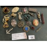 A VINTAGE COLLECTION OF TWENTY BROOCHES SOME SIGNED