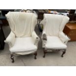 A PAIR OF MODERN WINGED FIRESIDE CHAIRS ON FRONT CABRIOLE LEGS