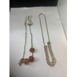 TWO SILVER NECKLACES MARKED 925 TO INCLUDE ONE WITH FOUR CHARMS