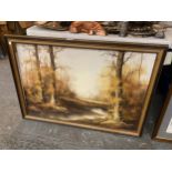 A LARGE FRAMED PAINTING OF A RIVER AND TREES IN AUTUMN SIGNED SILVAHA